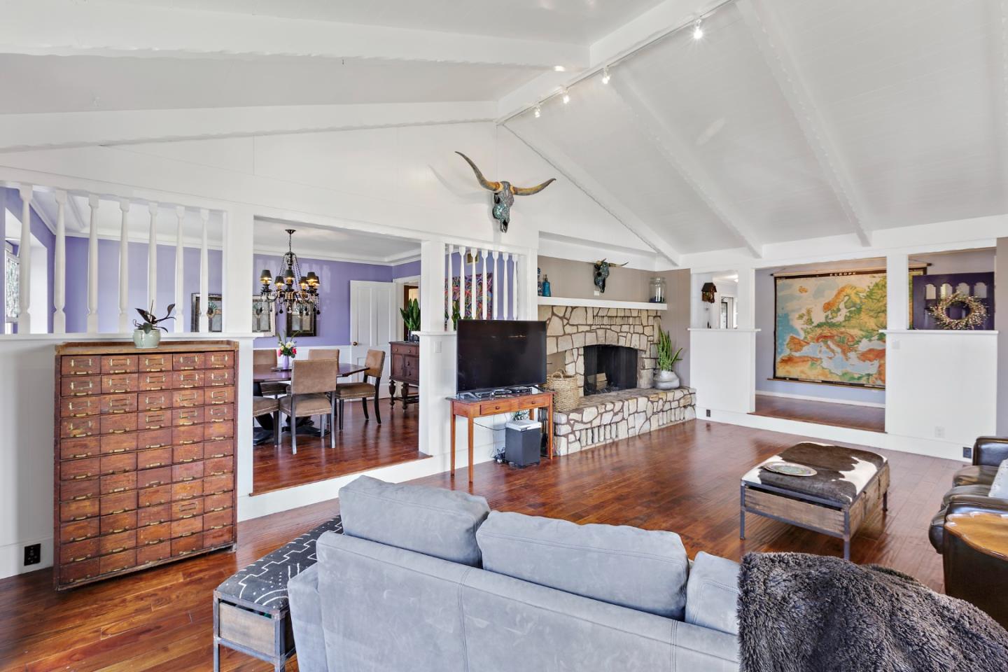 4853 Proctor Road Castro Valley, CA 94546 - Photo 8 of 43 a living room with furniture flat screen tv and a fireplace