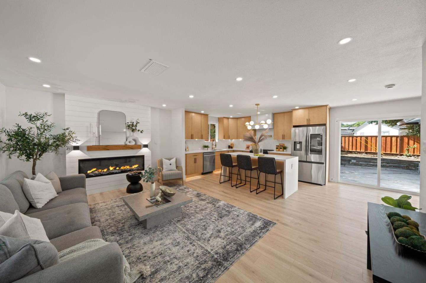 40515 Robin Street Fremont, CA 94538 - Photo 1 of 1 a living room with furniture and kitchen view