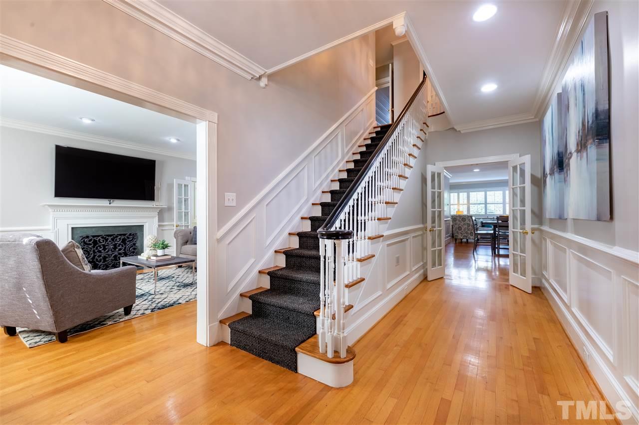 1110 Harvey Street Raleigh, NC 27608 - Photo 2 of 30 The Grand Foyer with living room and dining room on either side