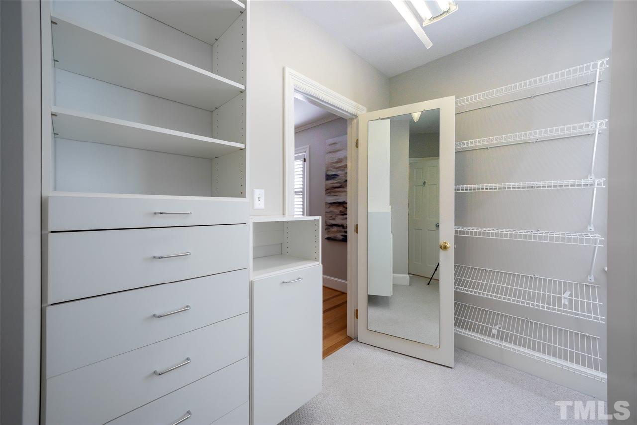 1110 Harvey Street Raleigh, NC 27608 - Photo 15 of 30 Large dual-area walk-in closet off of the master bedroom.