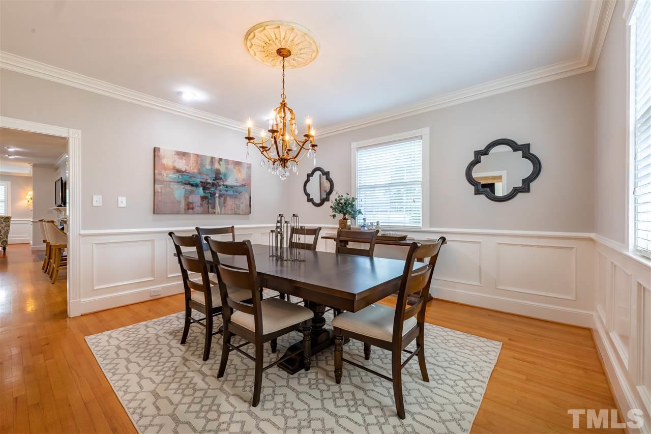 1110 Harvey Street Raleigh, NC 27608 - Photo 4 of 30 Separate, formal dining room provides plenty of space to entertain.