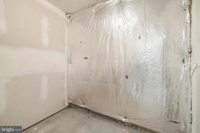 a view of a building with a on roof deck