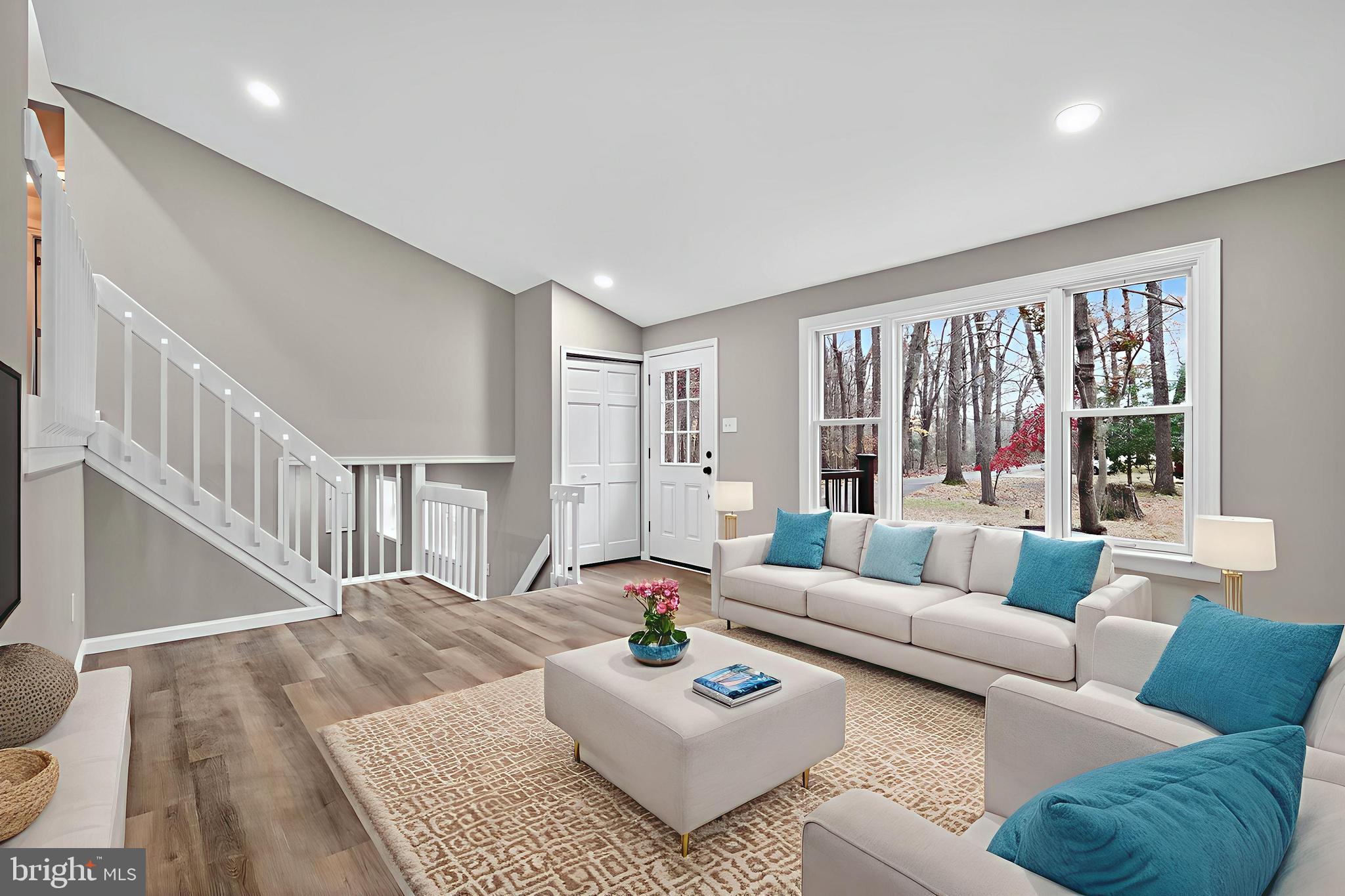 120 Gilbert Road Bordentown, NJ 08505 - Photo 11 of 52 a living room with furniture and a table with wooden floor
