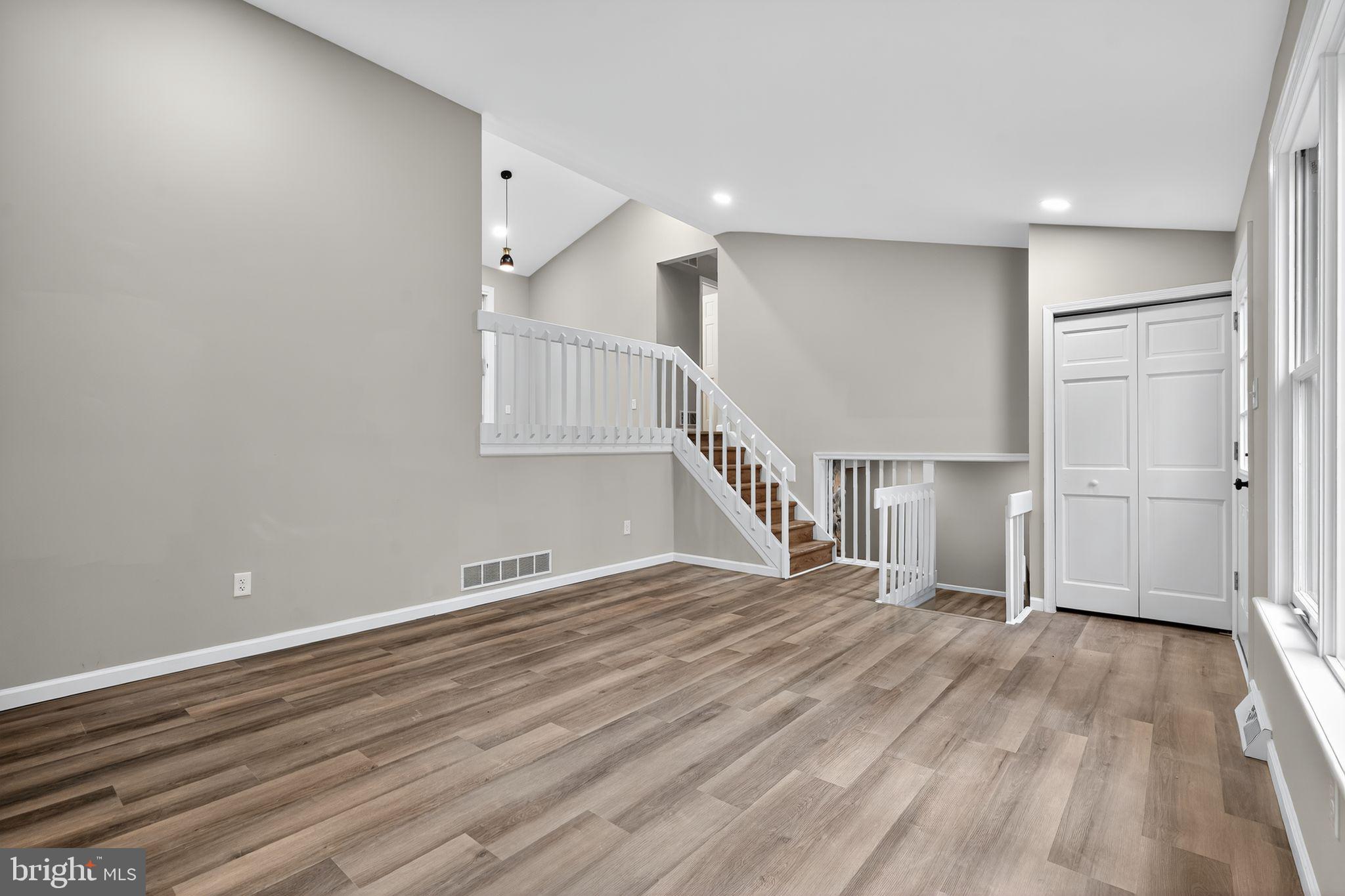 120 Gilbert Road Bordentown, NJ 08505 - Photo 14 of 52 a view of an empty room with wooden floor