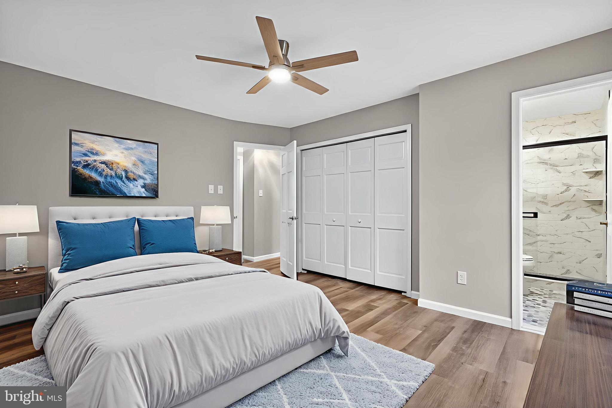 120 Gilbert Road Bordentown, NJ 08505 - Photo 25 of 52 a spacious bedroom with a bed and a painting on the wall