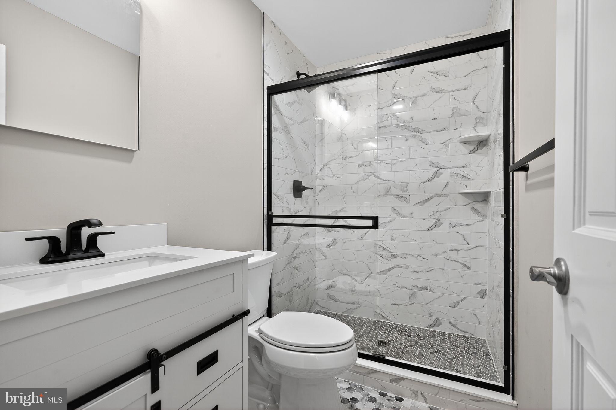 120 Gilbert Road Bordentown, NJ 08505 - Photo 27 of 52 a bathroom with a sink toilet and shower