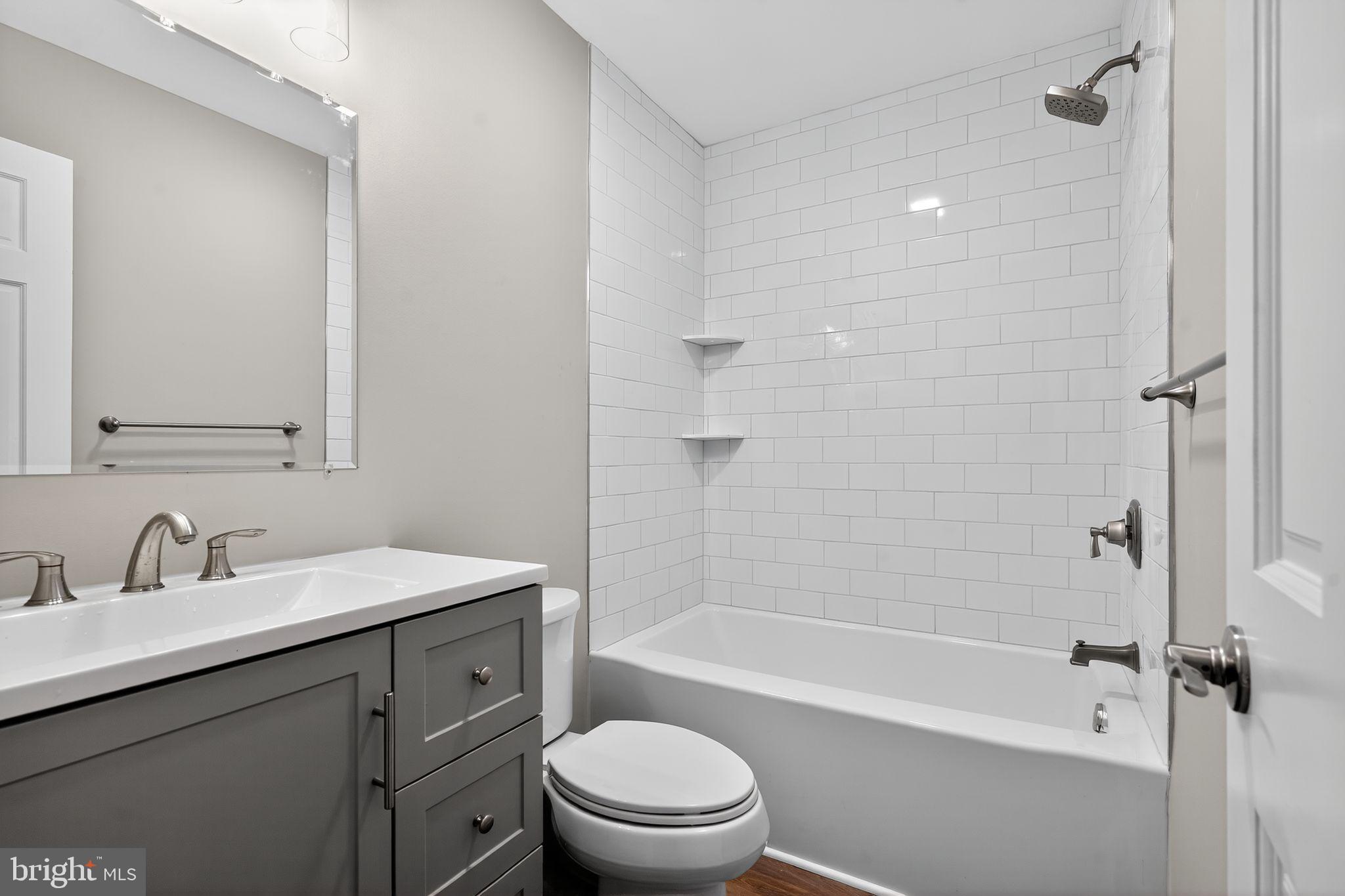 120 Gilbert Road Bordentown, NJ 08505 - Photo 33 of 52 a bathroom with a sink a toilet and shower