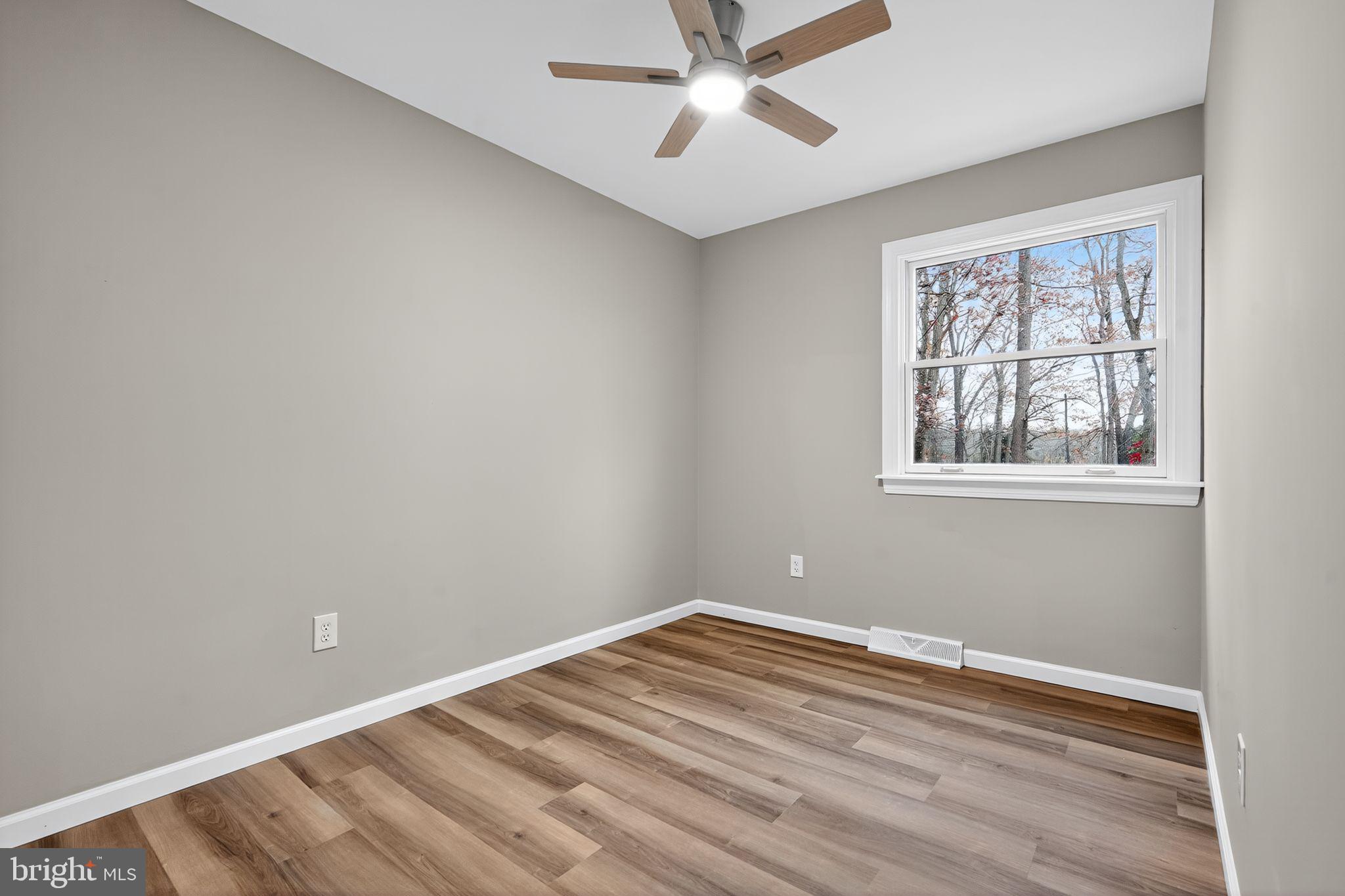 120 Gilbert Road Bordentown, NJ 08505 - Photo 34 of 52 a view of a big room with wooden floor and windows