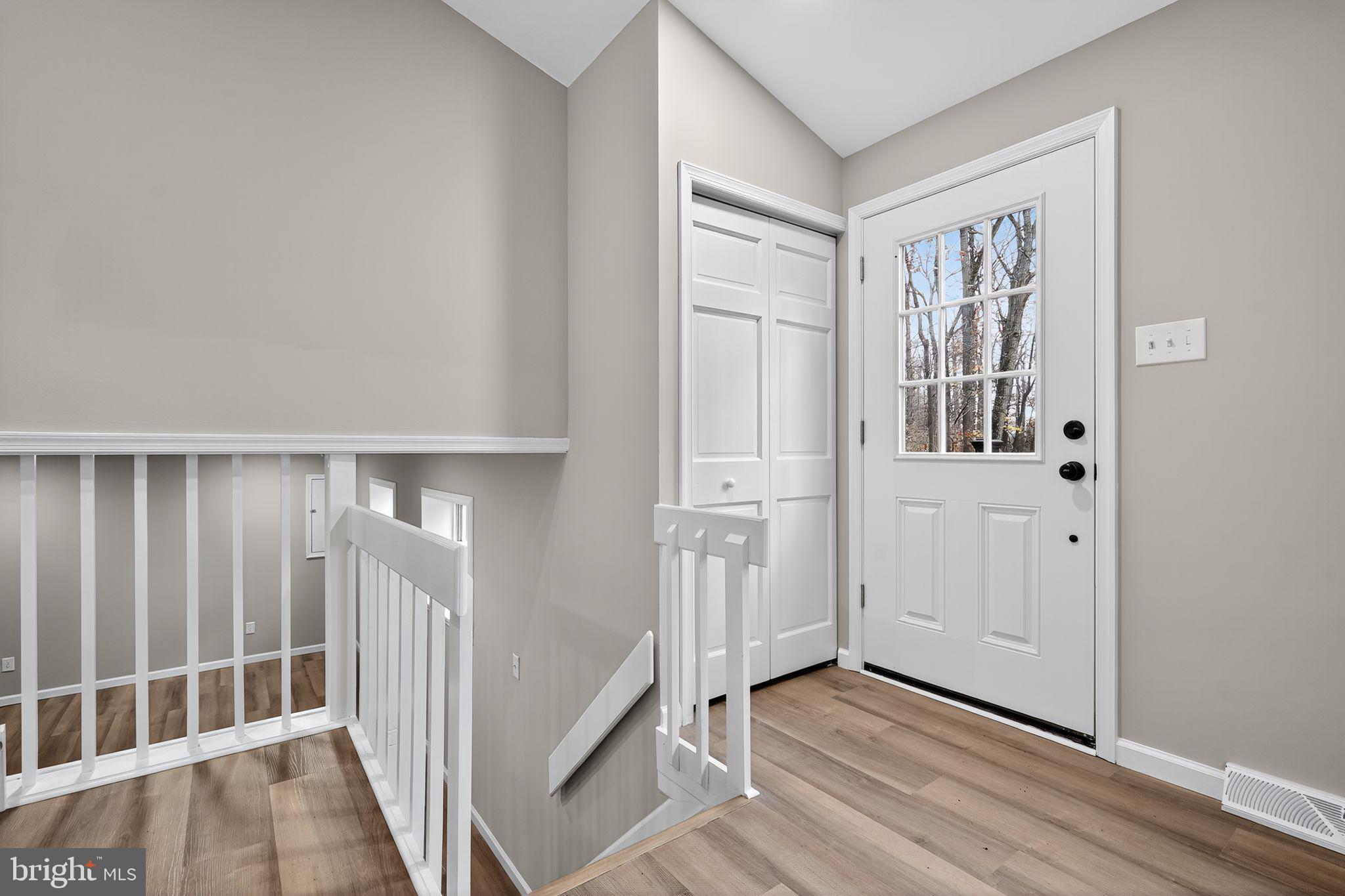 120 Gilbert Road Bordentown, NJ 08505 - Photo 8 of 52 a view of a entrance and room with wooden floor