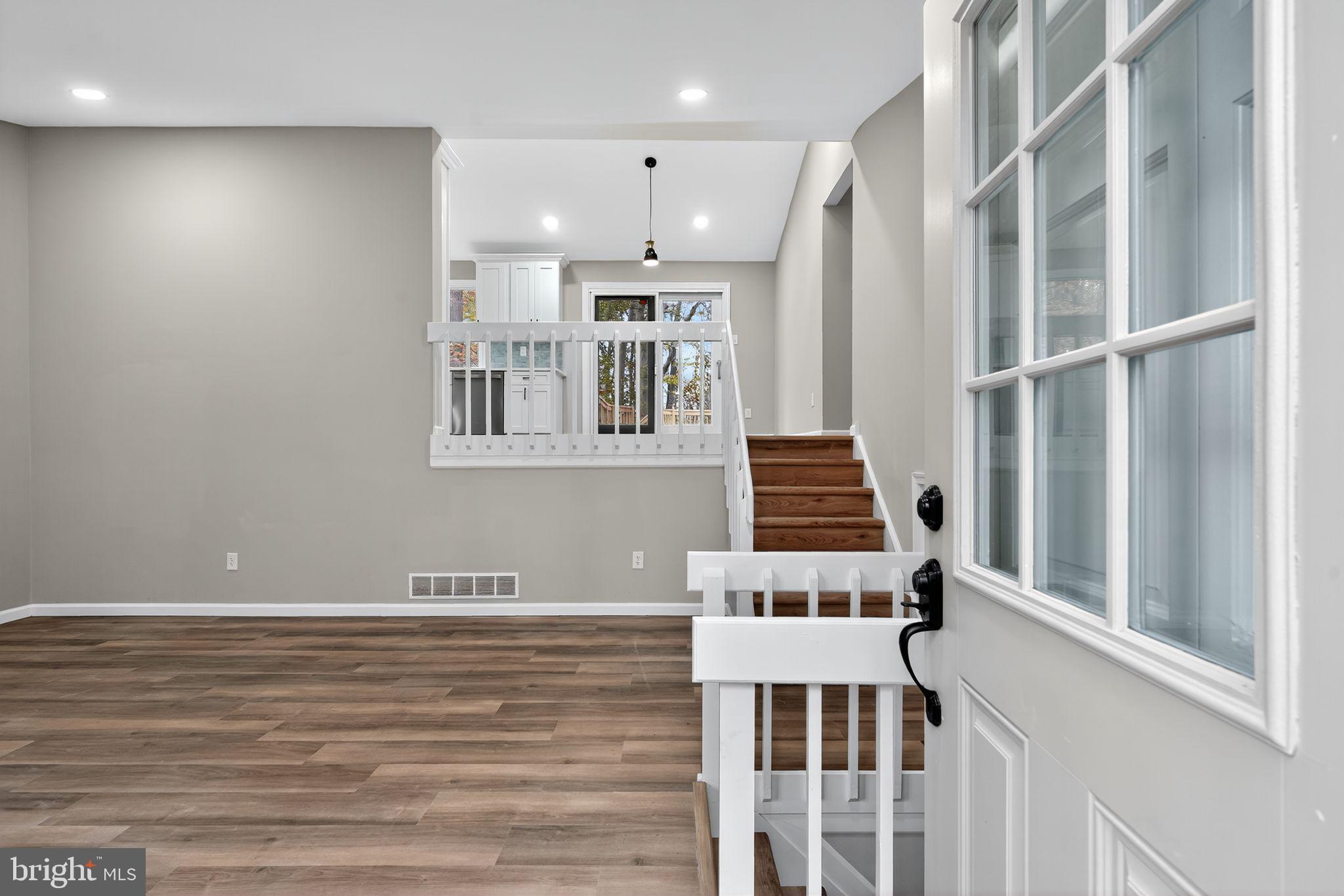 120 Gilbert Road Bordentown, NJ 08505 - Photo 9 of 52 a view of a bedroom with wooden floor and white walls