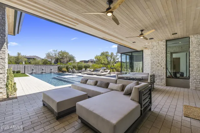 a outdoor space with lots of tables and chairs
