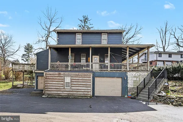 a view of house with a outdoor space