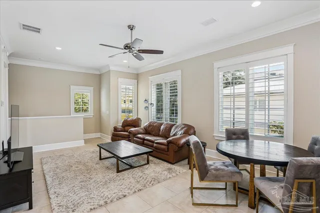 a living room with furniture and a window