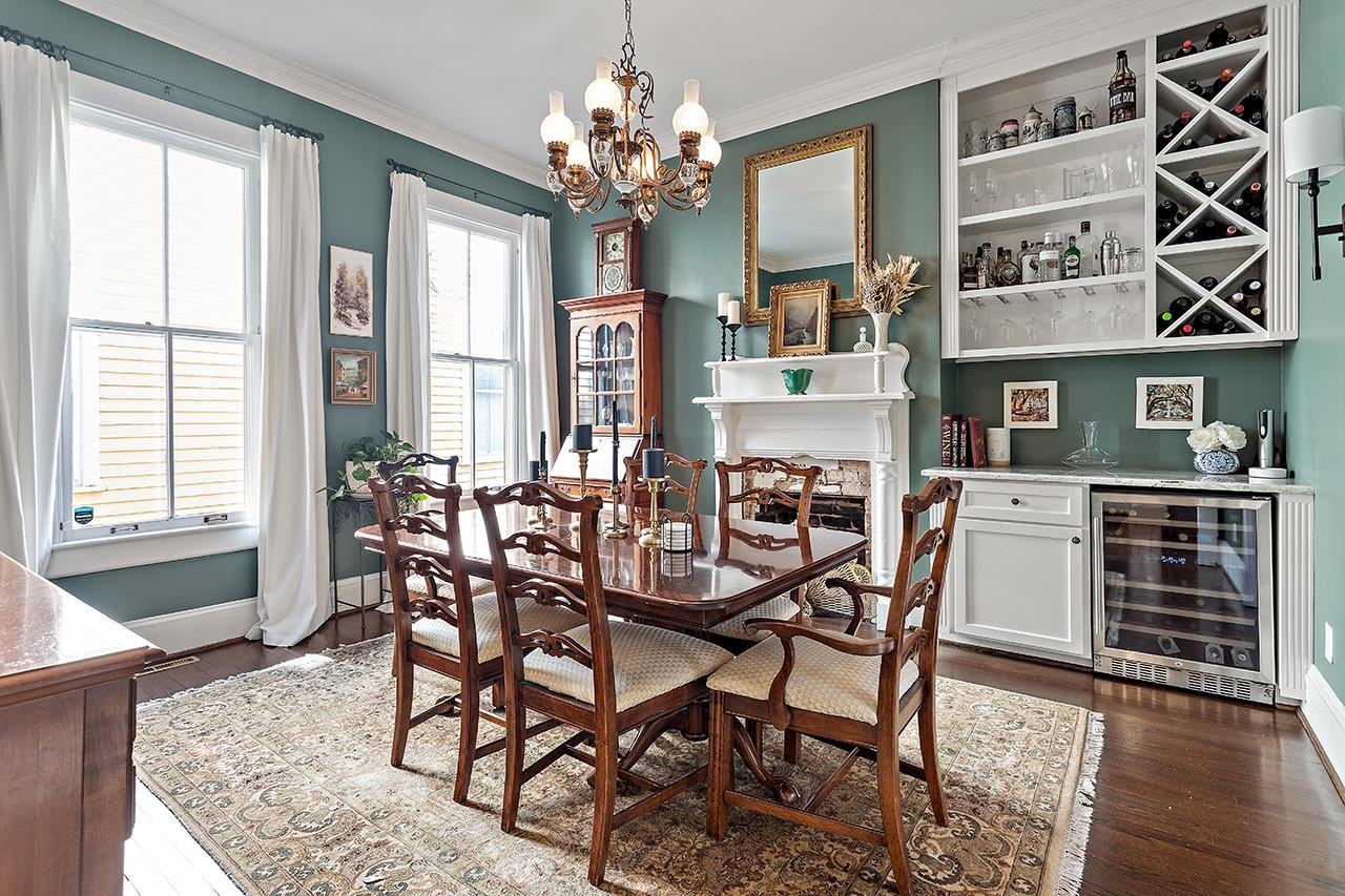 424 East Jones Street Raleigh, NC 27601 - Photo 4 of 27 a view of a dining room with furniture and wooden floor