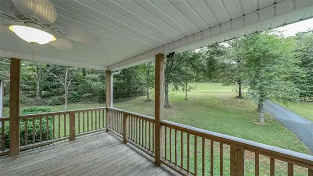 a view of a porch and a yard