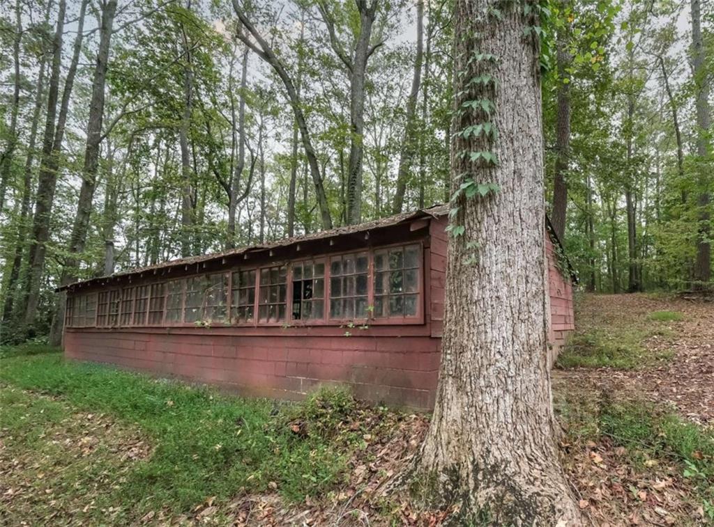7146 Old Beulah Road Lithia Springs, GA 30122 - Photo 41 of 45 a view of house with backyard