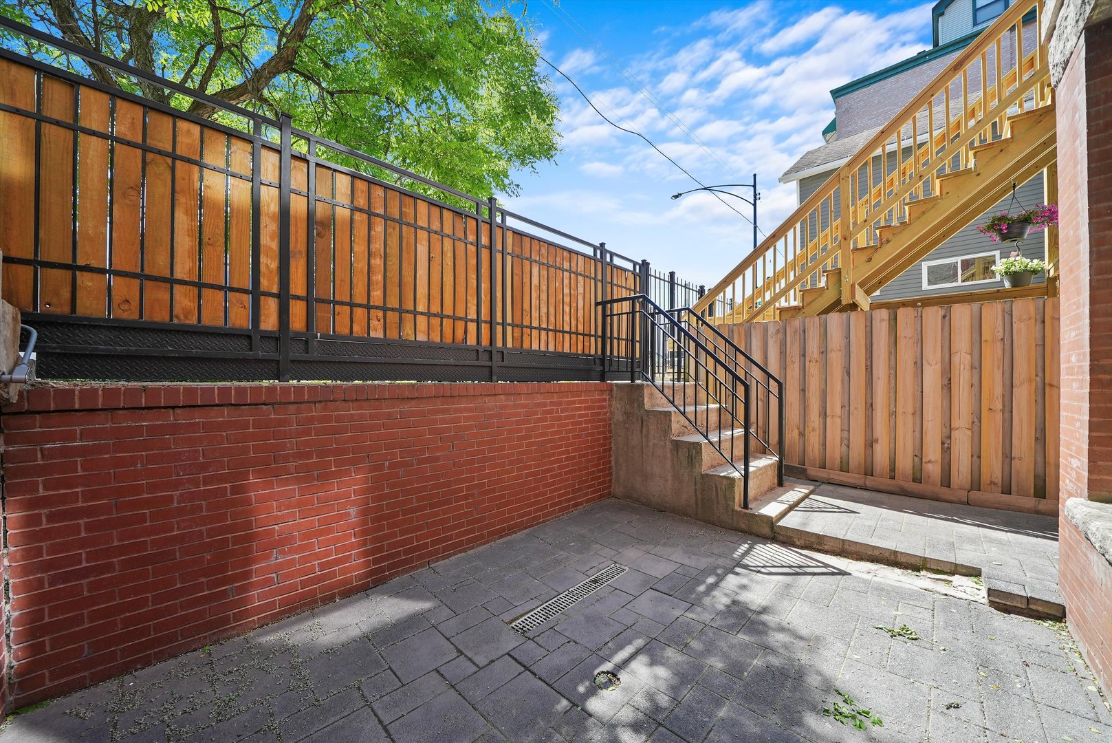 1936 South Racine Avenue Chicago, IL 60608 - Photo 45 of 48 a view of a backyard with wooden fence