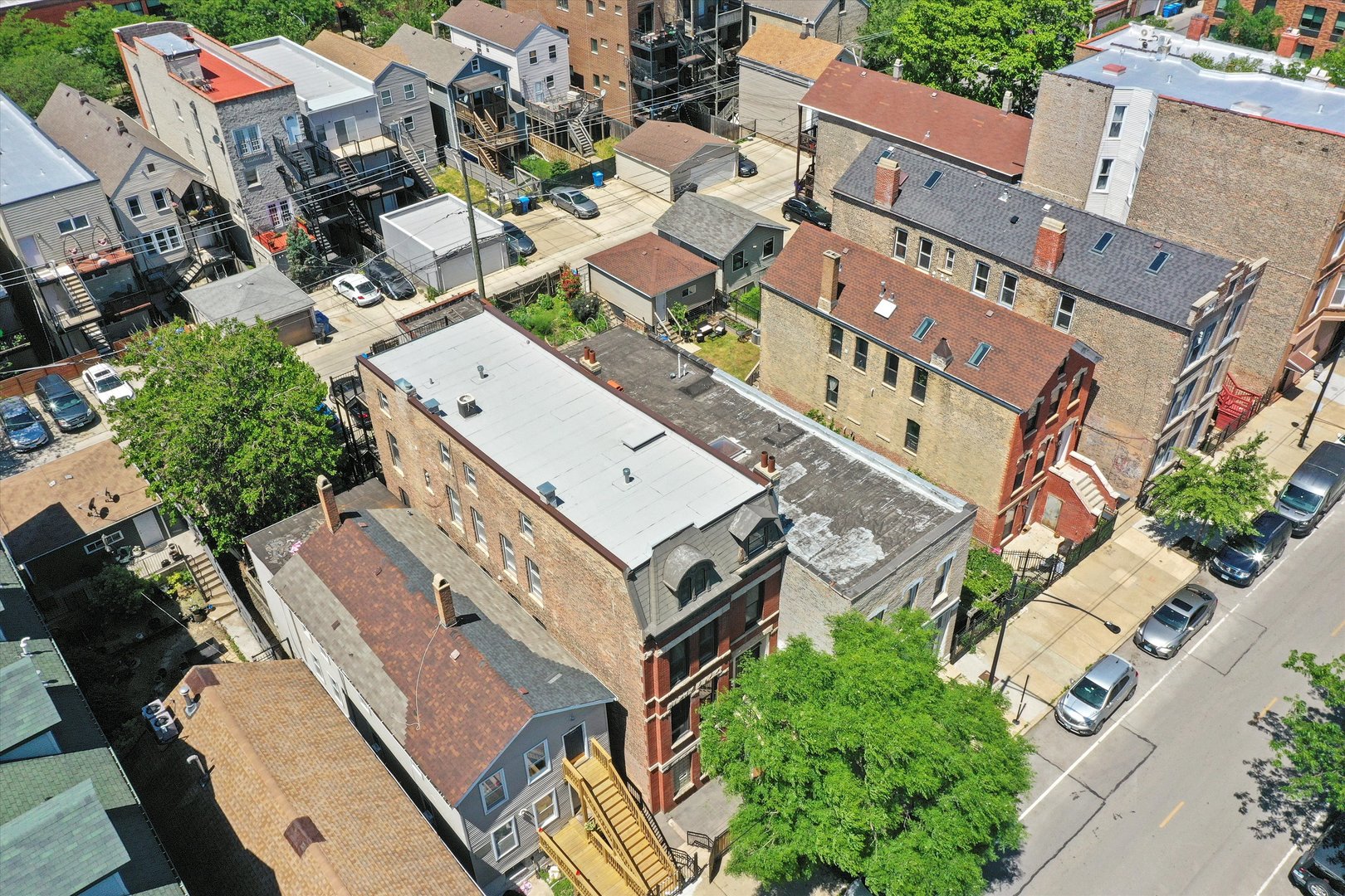 1936 South Racine Avenue Chicago, IL 60608 - Photo 46 of 48 an aerial view of a multi story building with yard