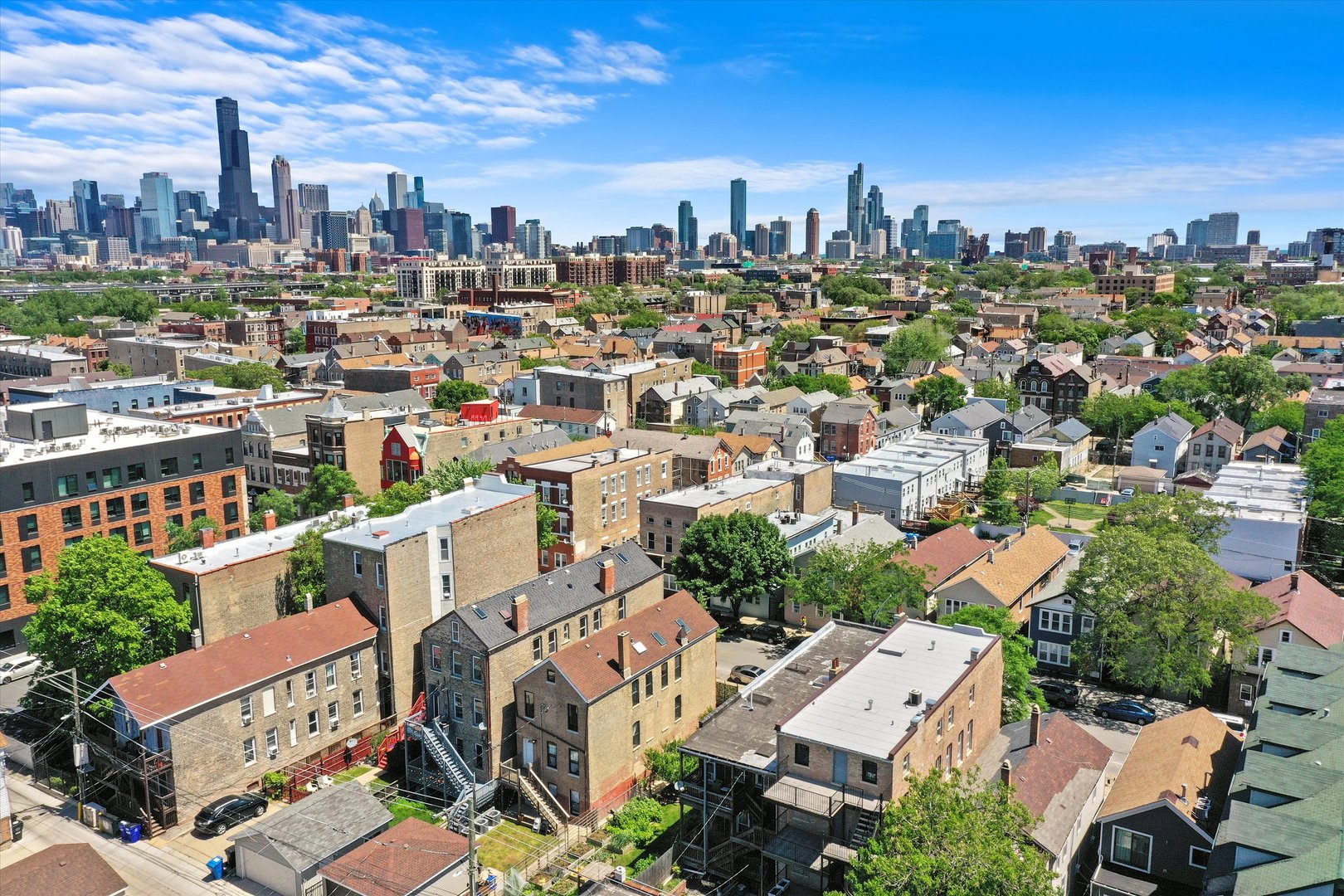 1936 South Racine Avenue Chicago, IL 60608 - Photo 48 of 48 an aerial view of a city with lots of residential buildings