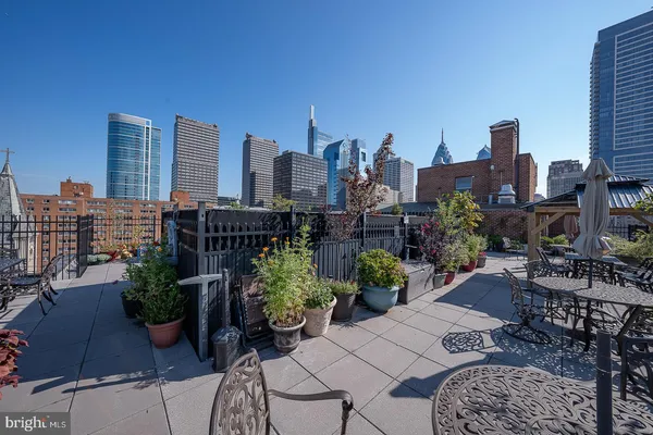 a view of a city with furniture