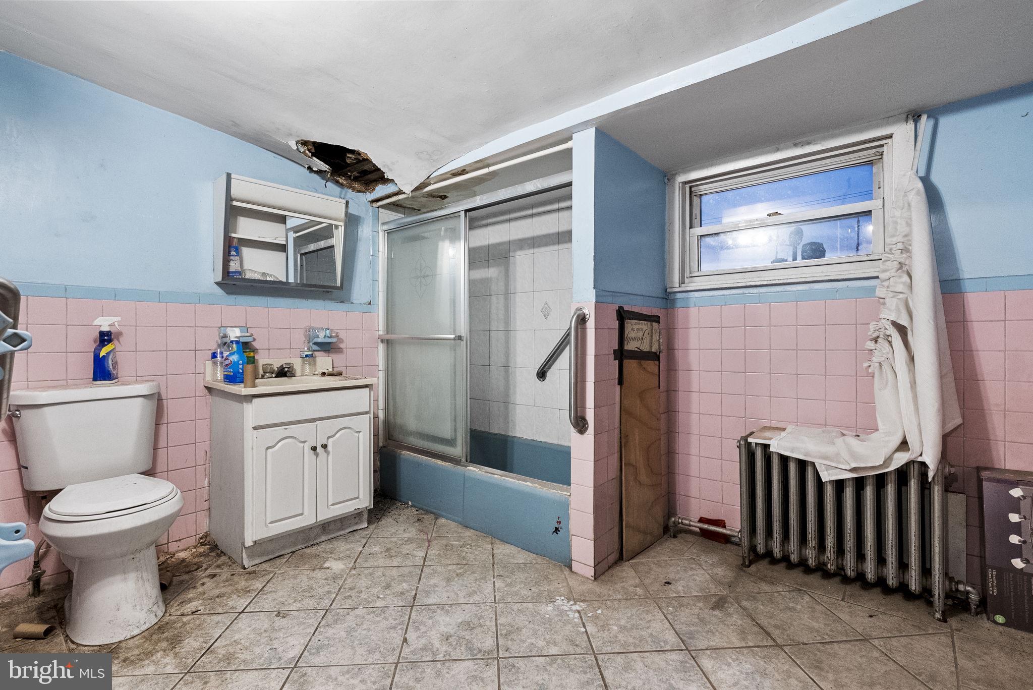 2730 Hope Street Philadelphia, PA 19133 - Photo 13 of 29 a bathroom with a sink toilet and shower