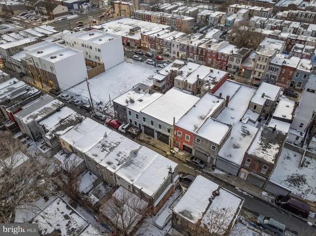 a view of a house with a door and a window