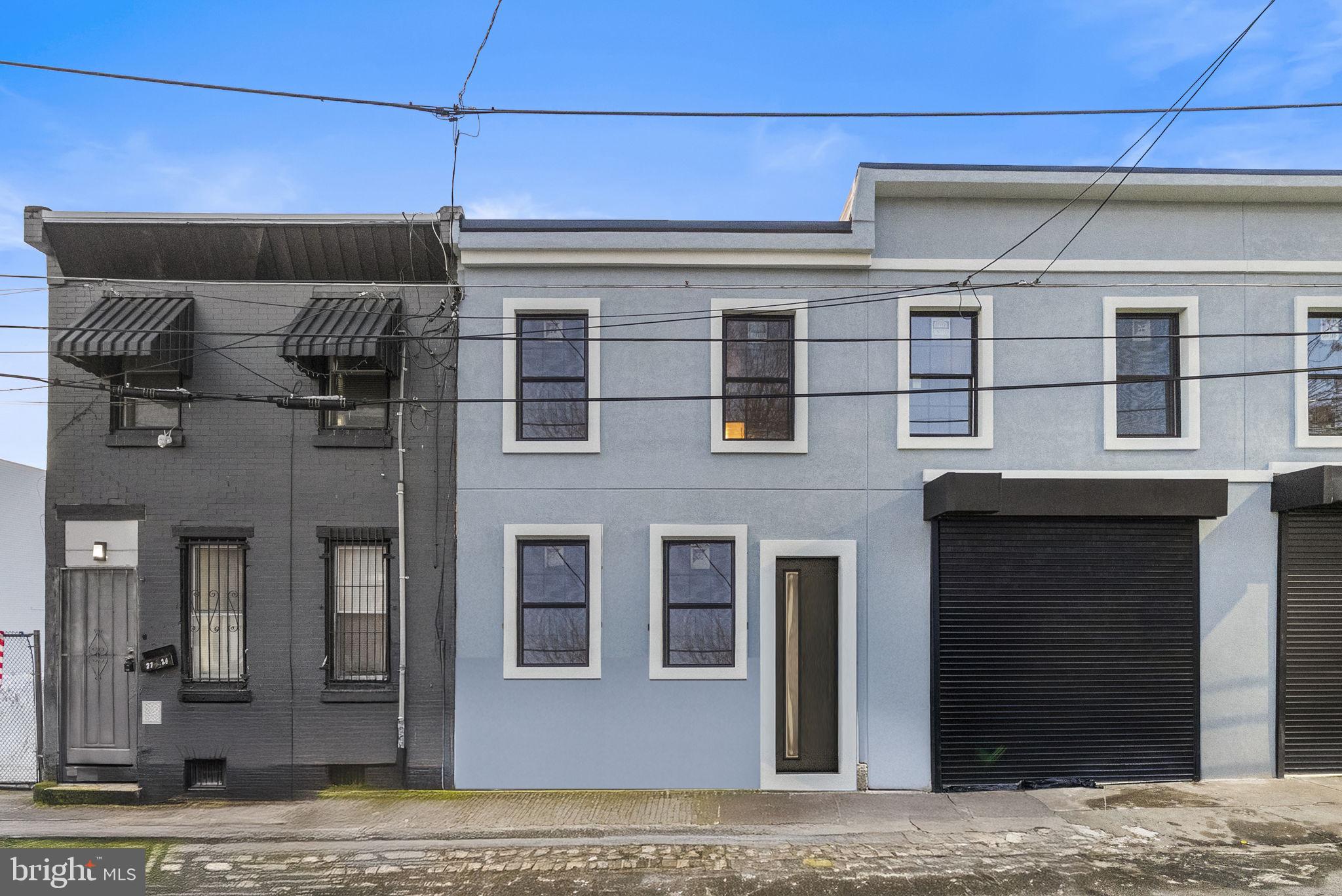 2730 Hope Street Philadelphia, PA 19133 - Photo 28 of 29 a view of a house with a door and a window