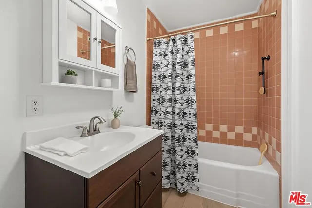 a bathroom with a sink and a bathtub