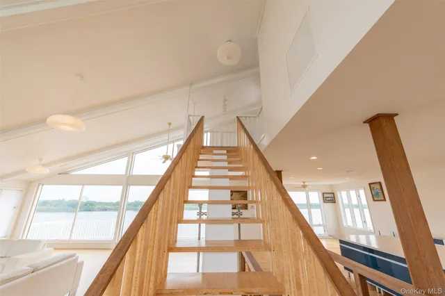 a view of staircase with black and white floor