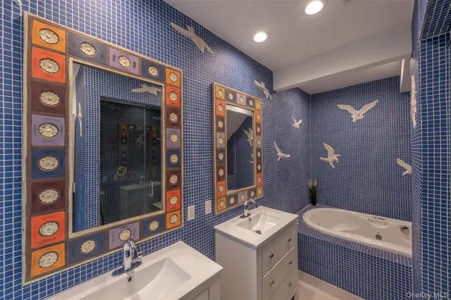 a bathroom with a bathtub and a sink