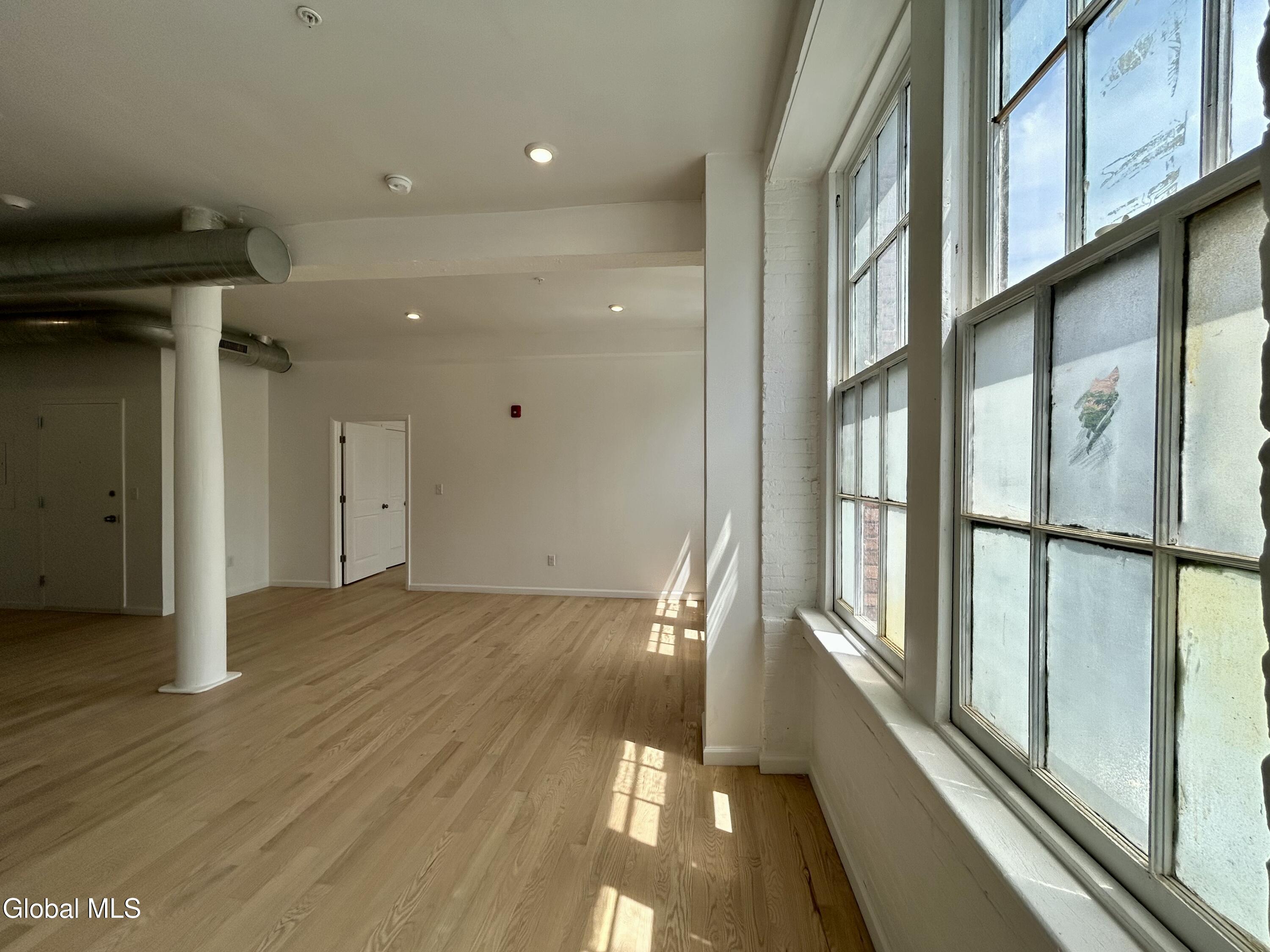 155 River Street, Unit 2D Troy, NY 12180 - Photo 19 of 22 2D Living Room from Bedroom 1 (Right)