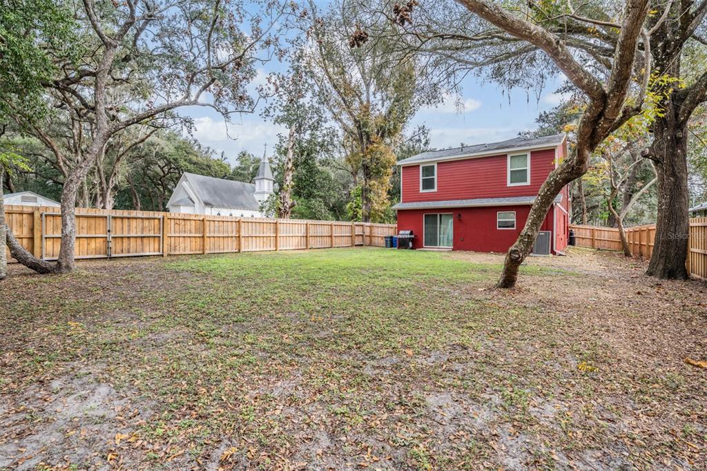 17415 Sweetwater Road Dade City, FL 33523 - Photo 66 of 72 a view of a yard in front of a house