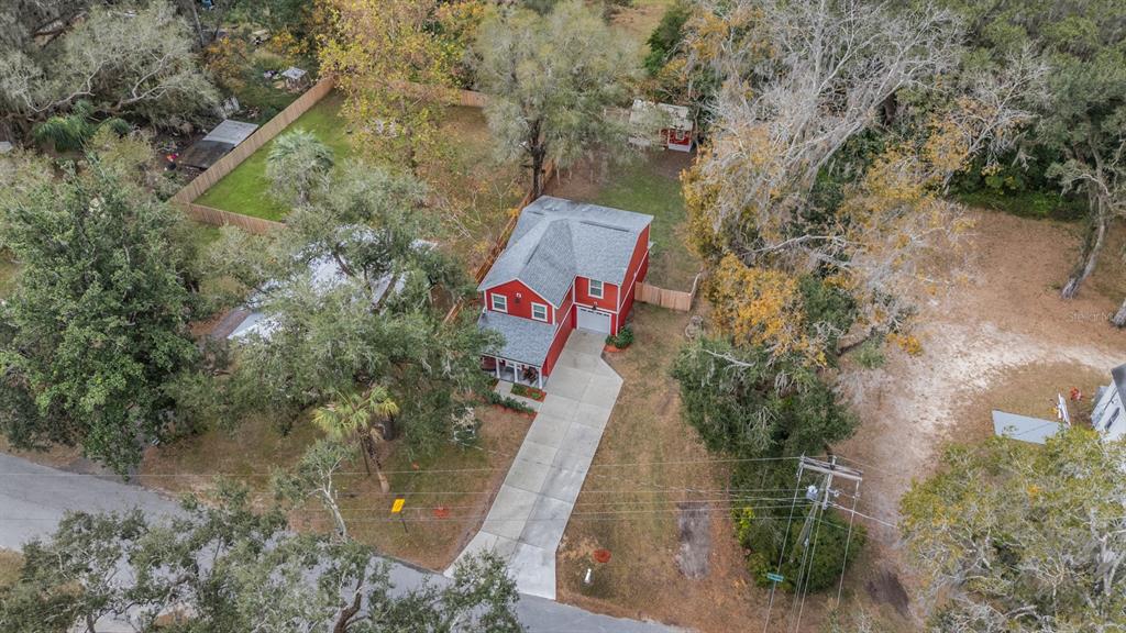 17415 Sweetwater Road Dade City, FL 33523 - Photo 69 of 72 an aerial view of residential house with outdoor space