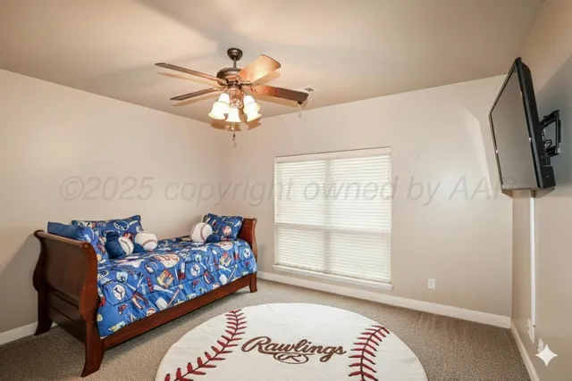 a bedroom with furniture and a window