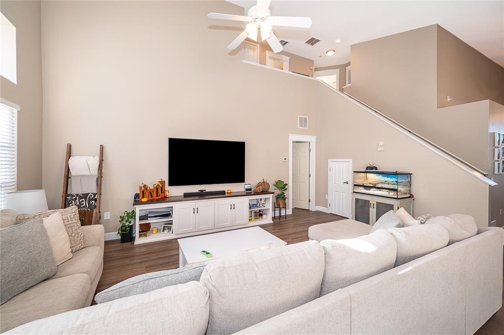 758 Seneca Meadows Road Winter Springs, FL 32708 - Photo 13 of 37 a living room with furniture and a flat screen tv
