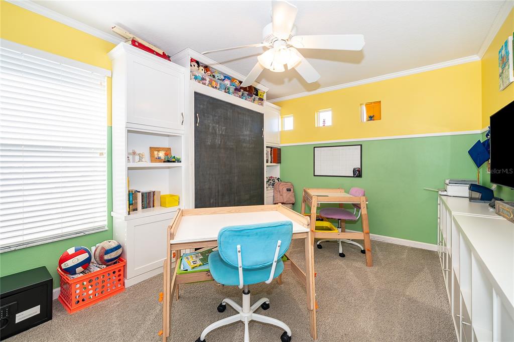 758 Seneca Meadows Road Winter Springs, FL 32708 - Photo 22 of 37 a view of a dining room with furniture and a window