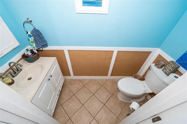 a bathroom with a sink and a vanity