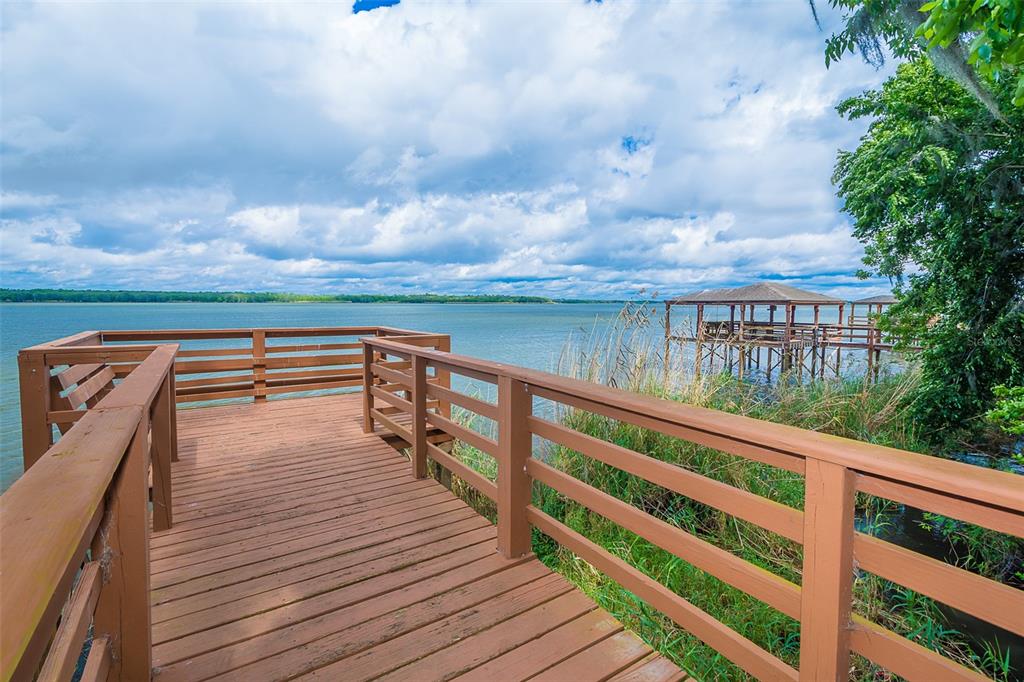 758 Seneca Meadows Road Winter Springs, FL 32708 - Photo 37 of 37 a view of balcony with wooden floor and fence