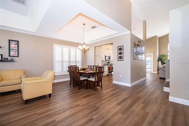 a view of a livingroom with furniture and a table