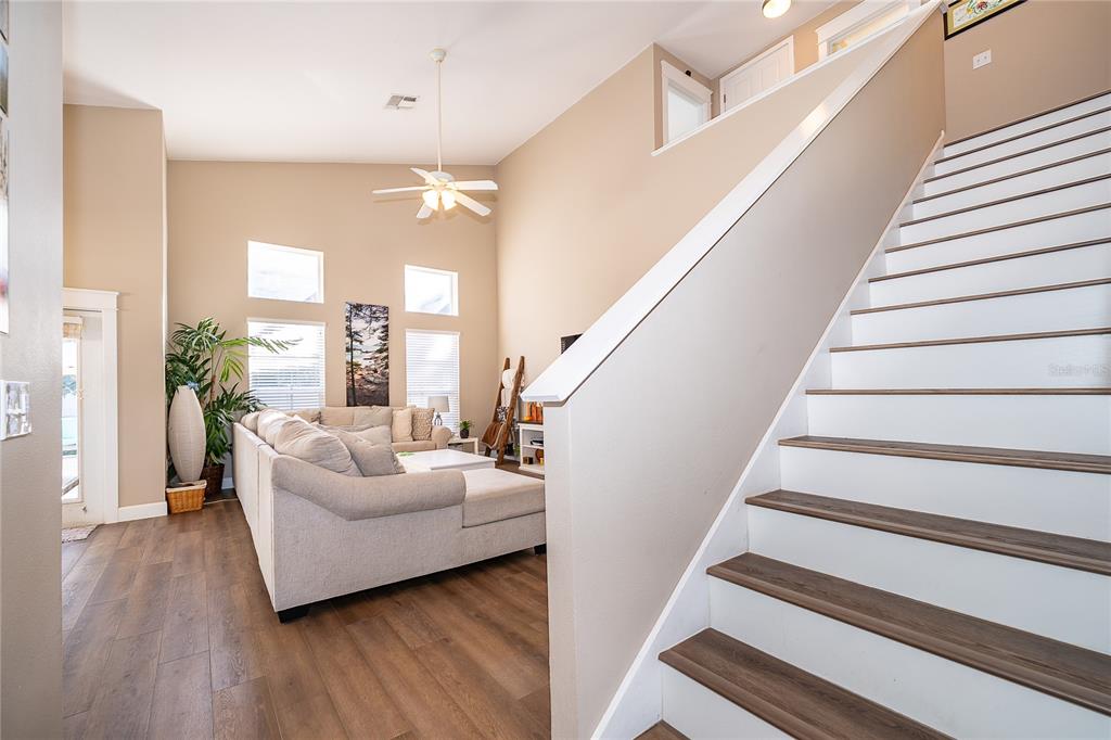 758 Seneca Meadows Road Winter Springs, FL 32708 - Photo 10 of 37 a living room with furniture and wooden floor