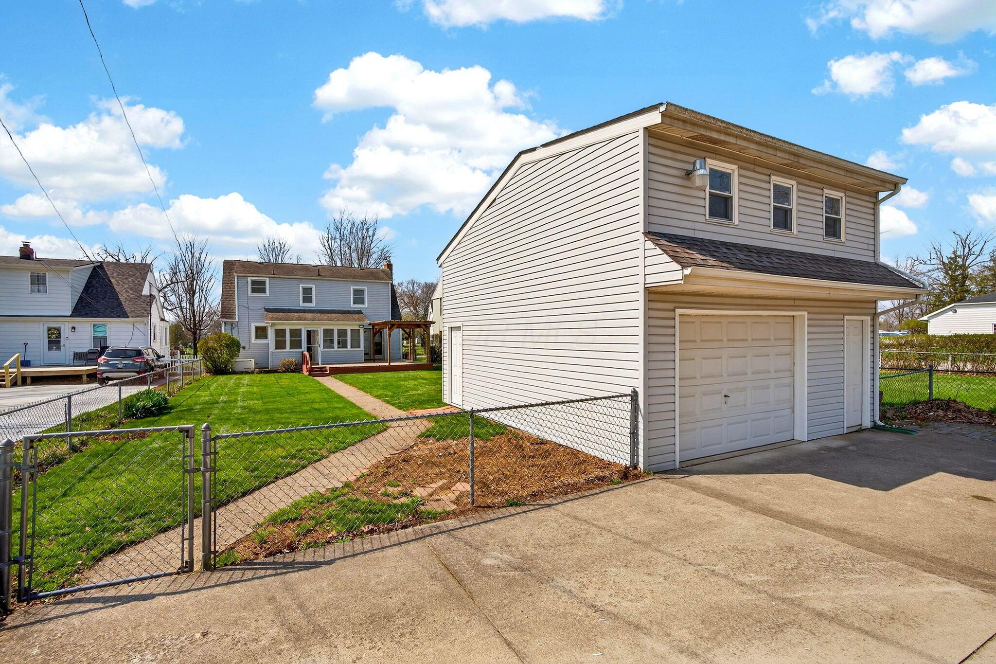 892 North Court Street Circleville, OH 43113 - Photo 2 of 58 An oversized 1.5 car garage with finished attic space above. Plenty of off street parking for company! The attic space is great for storage or what a mancave this could be or kid's hangout!