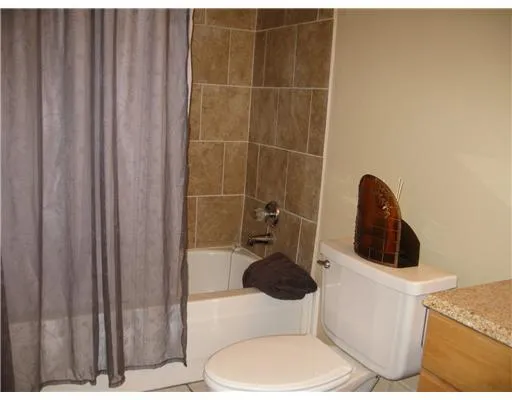 a bathroom with a toilet and a sink