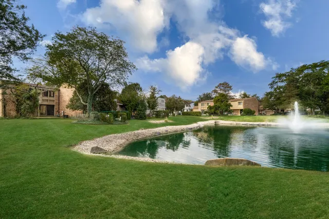 a view of a lake with houses