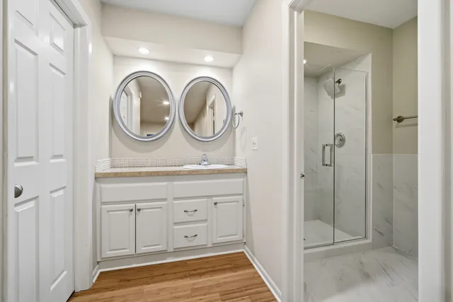 a bathroom with a sink and a mirror