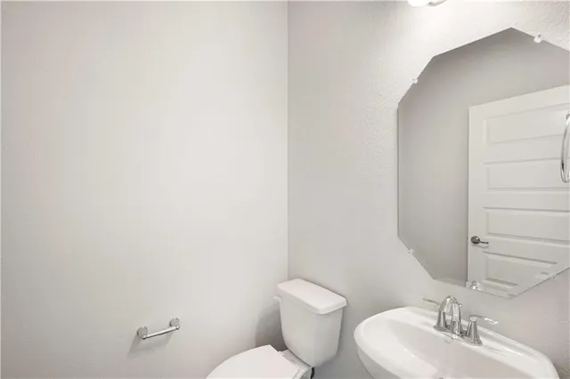a bathroom with a sink vanity and a mirror