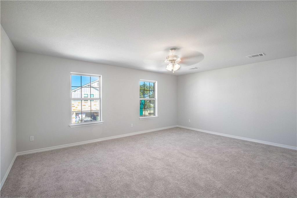 1616 Turtle Bay Loop Leander, TX 78641 - Photo 22 of 33 an empty room with a window