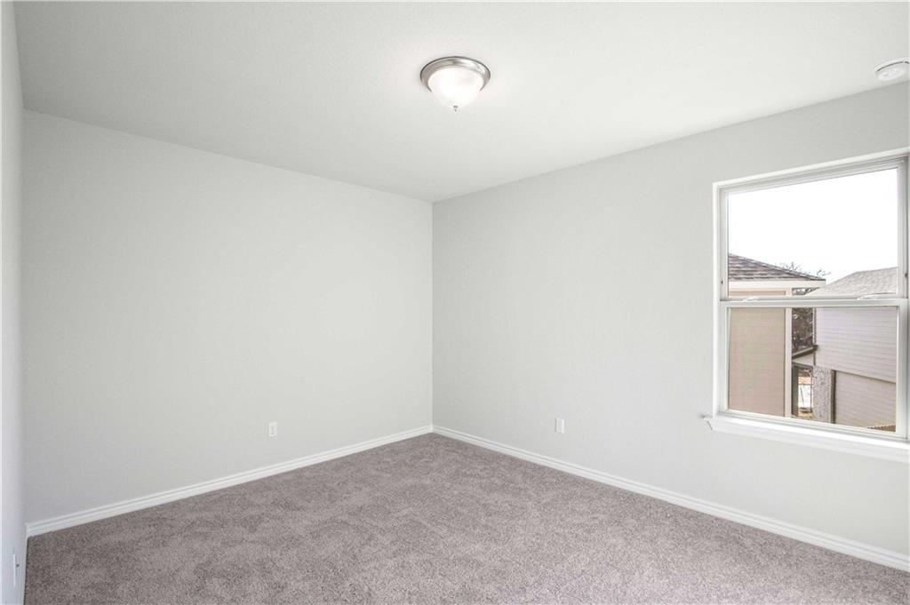 1616 Turtle Bay Loop Leander, TX 78641 - Photo 30 of 33 a view of an empty room with a window