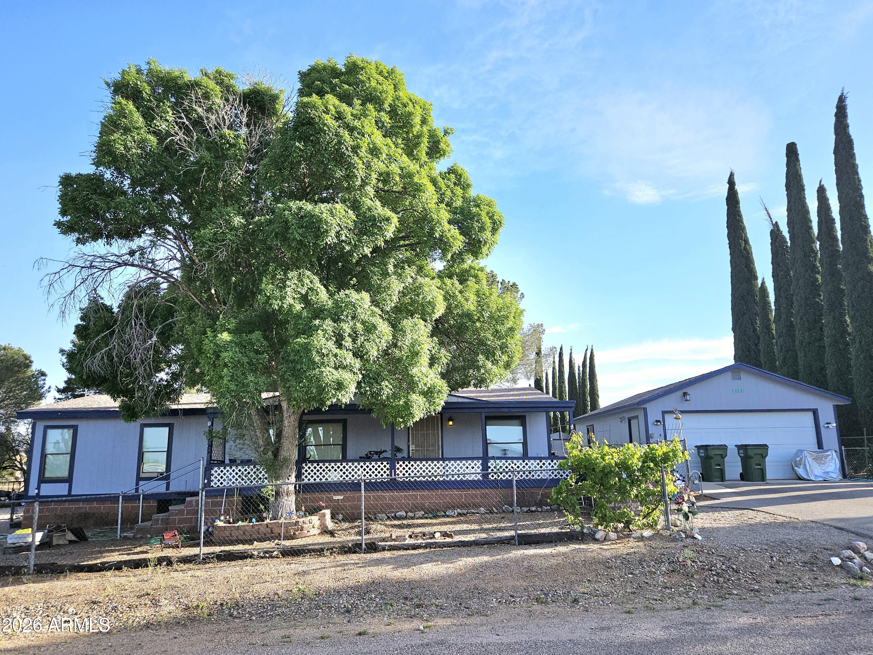 3145 West Citrus Road Benson, AZ 85602 - Photo 2 of 36 front view of a house with a street