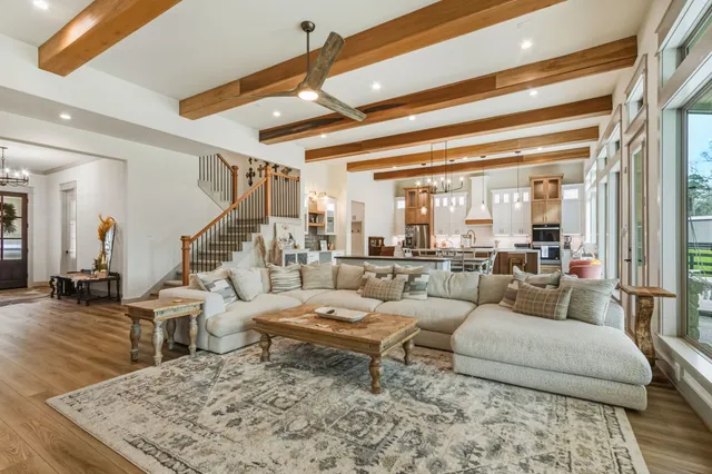 a bedroom with furniture and a window
