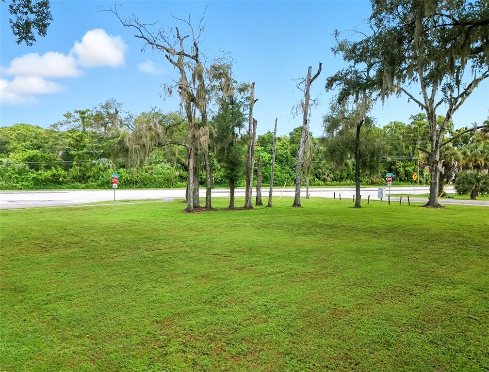 Florence Avenue Altamonte Springs, FL 32701 - Photo 5 of 12 a view of grassy field with benches and trees